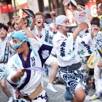 Dancing in the streets: Party-goers descend on the neighborhood of Koenji every year to join locals in celebrating the Koenji Awa Odori festival. | ELLE HARRIS