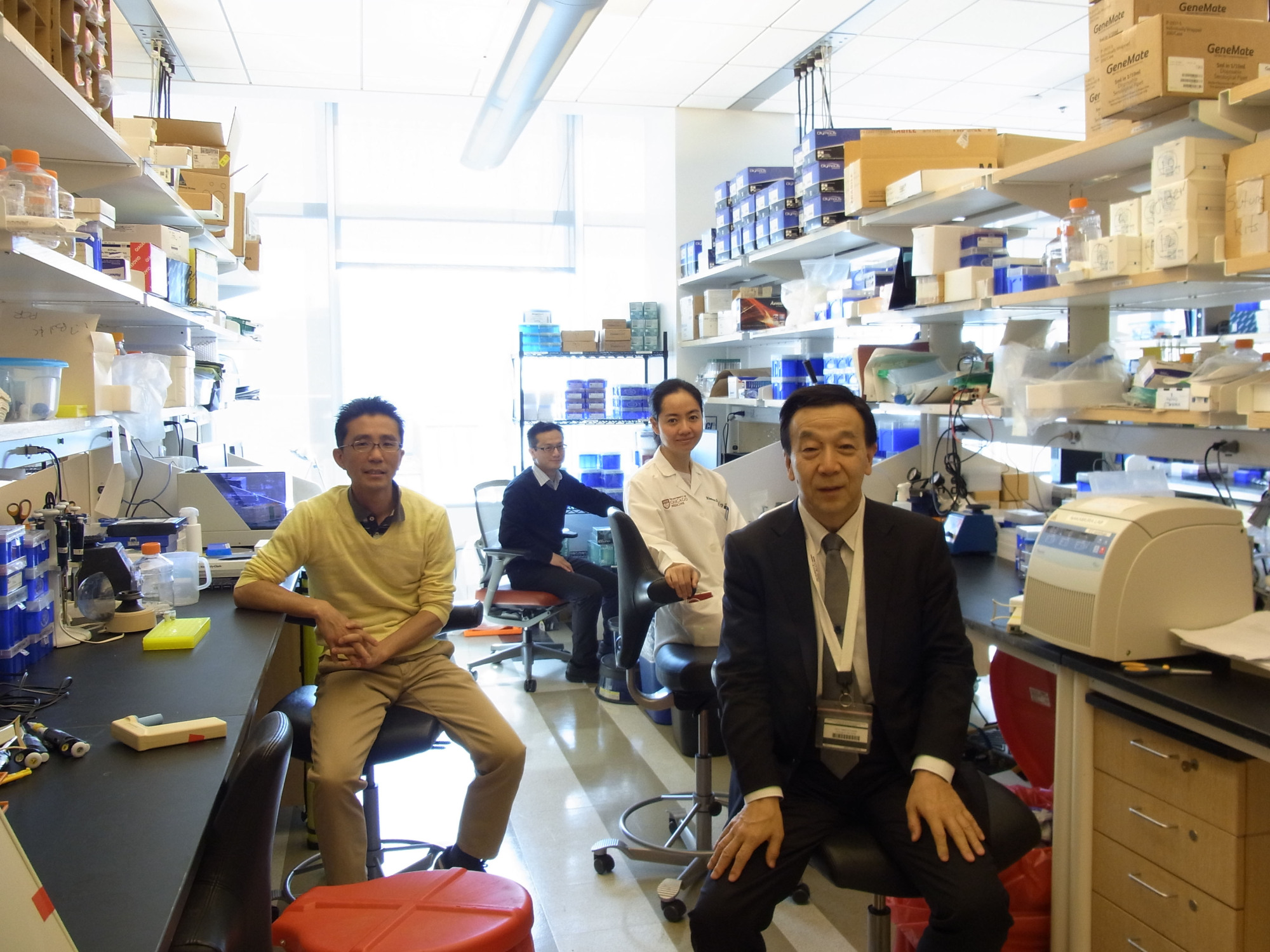 Team Nakamura: Yusuke Nakamura (right) runs a lab of 13 people at the University of Chicago.  | DANIEL MORALES