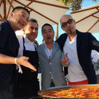 Paella time: Kentaro Nakahara, Takaaki Sugita and Yoshiteru Ikegawa pose with Pedro Tur (second from left) of Restaurant Sa Nansa in Ibiza. Spain meets 'washoku': Cooking along to the sizzling beat in Ibiza