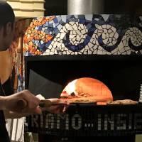 Hot as you like: Latteria Bebe\'s pizza oven in all its glory. | ROBBIE SWINNERTON