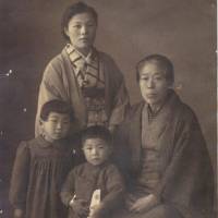 The recollections of Sadayoshi Yutani, seen here holding a toy model Zero in a family photo, encouraged Edgar and Ran Ying Porter to write “Japanese Reflections on World War II and the American Occupation.” 'Japanese Reflections on World War II and the American Occupation': War through the eyes of everyday Oita citizens