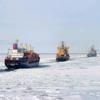 The MV American Tern is lead by two Russian icebreakers in 2006. Military Sealift Command | &#169; 2016, SERENDIPITY POINT FILMS INC.