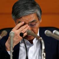 Bank of Japan Gov. Haruhiko Kuroda, shown at a July 20 news conference at BOJ headquarters in Tokyo,  has been waging an uphill battle against deflation  since April 2013. | REUTERS