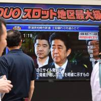 A television news broadcast shows Prime Minister Shinzo Abe addressing the media in Tokyo on Tuesday in response to North Korea’s successful launch of a ballistic missile that day. Can Abe show global vision?