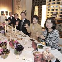 On her best
behavior: Former LDP lowerhouse lawmaker Mayuko Toyota (right) is seen here at a dinner event in Tokyo in March 2016. Be aware of Japanese workplace no-nos