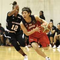 Speedy point guard Rui Machida drives against the University of South Carolina team in a scrimmage game on Tuesday at Tokyo\'s National Training Center. Machida has named to the Japan women\'s national team for the upcoming FIBA Asia Cup. | KAZ NAGATSUKA
