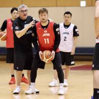 New head coach Julio Lamas instructs Japan men’s national team players during Friday’s practice at Tokyo’s National Training Center. New coach Lamas preparing Japan national team for FIBA Asia Cup