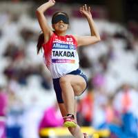 Chiaki Takada competes in the women\'s long jump T11 category at the World Para Athletics Championships in London on Thursday. Takada rewrote her own national record with a jump of 4.49 meters. | KYODO