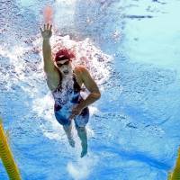Katie Ledecky competes during the women’s 1,500-meter freestyle final during the world swimming championships on Tuesday in Budapest. Ledecky dominates en route to third gold medal at worlds