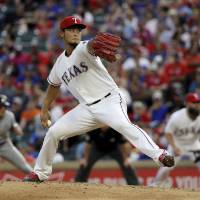 Texas starter Yu Darvish pitches against Miami in the fourth inning on Wednesday. Marlins hammer Darvish in rout