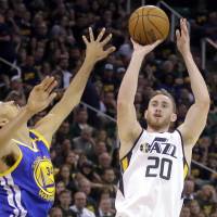 Utah’s Gordon Hayward shoots over Golden State’s Shaun Livingston during Game 3 of their second-round playoff series on May 6. Hayward to leave Jazz for Celtics