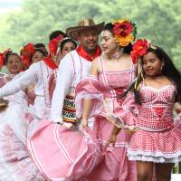 Colombian dance group Agrupacion Shizuoka perform during celebrations marking the 207th anniversary of Independence Day at an event titled Fiesta de Colombia in Hibiya Park on July 16. | COURTESY OF THE COLOMBIAN EMBASSY