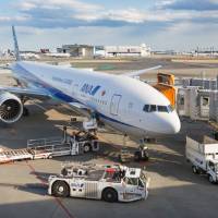 An All Nippon Airways jetliner is seen at Narita airport in March last year. ANA's net jumps nearly eight-fold thanks to Peach tailwind, strong demand in first quarter