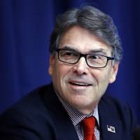 Energy Secretary Rick Perry attends a July 18 news conference at the National Press Club in Washington. The Trump administration says a Pennsylvania-based coal company has won a contract to supply coal used for heating to Ukraine’s state-owned power company. The deal announced Monday calls for Xcoal Energy and Resources to ship 700,000 tons of thermal coal to the Ukraine to heat homes and businesses. Trump camp hails firm's deal to export Pennsylvania coal to Ukraine