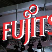 Fujitsu Ltd. plans to boost its manpower in the Philippines and India in an effort to enhance information technology services abroad and cut costs. | BLOOMBERG