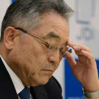 Nobuhiro Higashiiriki, chairman and chief executive officer of Japan Display Inc., attends a news conference in Tokyo on Aug. 9. Bearish bets on Japan Display approaches record after restructuring plan announcement