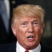 U.S. President Donald Trump speaks during an event Monday at the White House in Washington. Trump is renewing his attacks on Amazon, and he says the company is “doing great damage to tax paying retailers.” Amazon did not immediately respond to an emailed request for comment. Trump goes after Amazon, again over job losses, its failure to pay 'internet taxes'