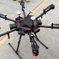 A drone that a border patrol agent spotted swooping over a border fence with Mexico on Aug. 8 near a San Diego crossing is displayed in this undated photo. Man is charged with flying drones to bring drugs from Mexico