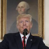 President Donald Trump pauses while speaking in the Diplomatic Reception Room of the White House in Washington Monday. Is it really so far-fetched to put Robert E. Lee in the same category as George Washington, as President Donald Trump suggested Tuesday? Many historians say yes. Defiant Trump seen increasingly isolated after defense of white nationalists