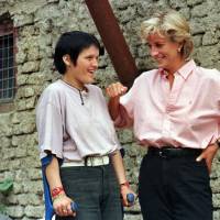 Britain’s Diana, Princess of Wales, chats with 15-year old land mine victim Bosnian Muslim girl Mirzeta Gabelic, in front of Mirzeta’s home in Sarajevo, while Diana was on a visit to the region as part of her campaign against land mines in 1997. The Princess died 20-years ago after a car crash Aug. 31, 1997, in Paris, and the legacy she left seems to live on through her two sons, who have adopted their mother’s more personal approach to the monarchy and to the public. Diana's common touch connected with public, changed the monarchy forever