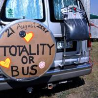 A minibus parked in a designated eclipse viewing area is seen in a campground near Guernsey, Wyoming, Sunday. Millions flooding into U.S. towns in path of Monday's total eclipse