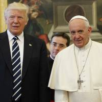 U.S. President Donald Trump stands with Pope Francis during a May 24 meeting at the Vatican. Some evangelical supporters of Trump are seeking a meeting with Pope Francis over a recent critical article in a Vatican-approved journal. A leader of Trump’s evangelical advisory board said they were responding to the journal article published last month that accused some American Catholics of forming a political alliance of “hate” with evangelicals who back the president. Evangelical backers of Trump seek meeting with pope over Vatican 'hate' alliance article