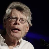Author Stephen King speaks at Book Expo America on June 1 in New York. Retaliating against Trump, Stephen King says president can't see 'It'