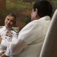 U.S. Pacific Command chief Adm. Harry Harris (left) is received by Philippine President Rodrigo Duterte during a courtesy call at the Malacanang Palace in Manila on Aug. 23. White House considering Pacific Command chief Harry Harris for Australian ambassador post: report