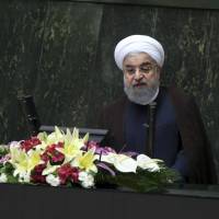 Iranian President Hassan Rouhani speaks in a session of parliament to debate his proposed Cabinet, in Tehran Tuesday. Iran’s president issued a direct threat to the West on Tuesday, claiming his country is capable of restarting its nuclear program within hours — and quickly bringing it to even more advanced levels than in 2015, when Iran signed the nuclear deal with world powers. Iran could quit nuclear deal in 'hours' and at higher level if U.S. levels new sanctions: Rouhani