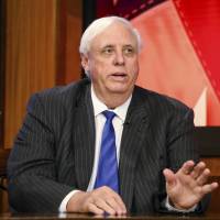 West Virginia Gov. Jim Justice speaks during a March town hall meeting, at WSAZ’s studio in Huntington. Justice is switching parties to join Republicans as President Donald Trump plans a visit to the increasingly conservative state. Justice’s plans were confirmed to The Associated Press on Thursday by a Democratic Party official with knowledge of his plans. Once 'trying to take up for the little guy' Democrat, West Virginia governor switches to GOP ahead of Trump visit