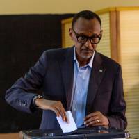Rwandan President Paul Kagame casts his vote in Kigali on Friday. In landslide, Rwanda leader Kagame wins third term with around 98% of votes