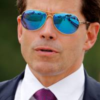 White House Communications Director Anthony Scaramucci accompanies U.S. President Donald Trump to an event about his planned drive to battle the street gang Mara Salvatrucha, or MS-13, at a gathering of federal, state and local law enforcement officials in Brentwood, New York, on Friday. Dead wrong: Harvard apologizes for saying in alumni directory that Scaramucci had passed away