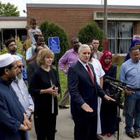 Minnesota Gov. Mark Dayton speaks Sunday at a news conference at the Dar Al Farooq Islamic Center in Bloomington, Minnesota, where an explosion damaged a room and shattered windows as worshippers prepared for morning prayers early Saturday. Minnesota mosque blast 'deeper and scarier' than threats