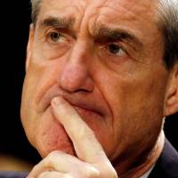 Robert Mueller pauses after making an opening statement at the U.S. Senate Judiciary Committee hearing on Capitol Hill in Washington in 2013. | REUTERS