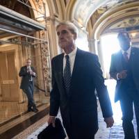 Special Counsel Robert Mueller departs after a closed-door meeting with members of the Senate Judiciary Committee about Russian meddling in the election at the Capitol in Washington on June 21. | AP