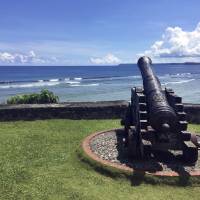A replica of a cannon used during the Spanish occupation in the 19th century stands outside the Guam government offices in Hagatna on Friday. Should U.S. shoot down Guam-bound North Korean missiles?