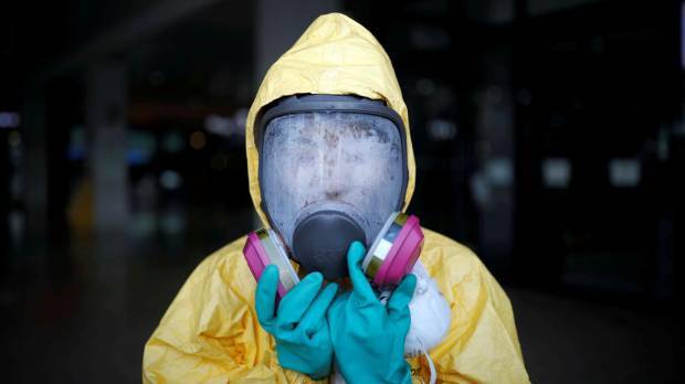 A woman takes part in an anti-terrorism drill as a part of the Ulchi Freedom Guardian exercise in Goyang, South Korea, on Monday. U.S. Pacific Command chief says diplomacy — not military action — key to North Korea crisis