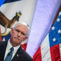 U.S. Vice President Mike Pence gestures during a joint press conference with Chilean President Michelle Bachelet (not pictured) at La Moneda presidential palace in Santiago Wednesday. Pence ducks questions on Trump's Charlottesville comments but hits 'dangerous fringe groups'