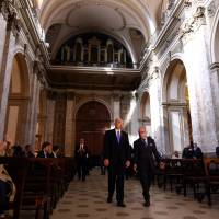U.S. Vice President Mike Pence (center left) and Argentina’s Foreign Minister Jorge Faurie visit Buenos Aires’ cathedral on Tuesday. Pence praises Argentina as model for Latin America