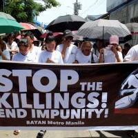 Relatives and loved ones of Leover Miranda, 39, who was killed during President Rodrigo Duterte’s ruthless war on drugs, take part in a funeral march at a cemetery in Metro Manila on Sunday. Philippine churches to ring bells to protest killings under Duterte's crackdown on drugs