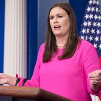 White House spokesman Sarah Huckabee Sanders speaks at the press briefing at the White House in Washington Monday. | AFP-JIJI
