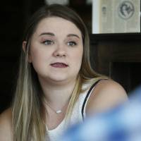 Danyelle Dyer talks during an Aug. 9 interview in Edmond, Oklahoma. Dyer had to obtain a court order after the man who molested her when she was 7 years old moved in next door. Victim suffers again under legal loophole of many states: Sex offender can live next door