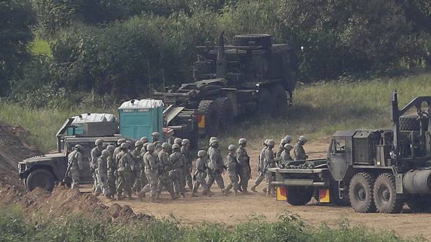 U.S. Army soldiers move during the annual U.S.-South Korea Ulchi Freedom Guardian military exercise in Paju, South Korea, near the border with the North, in August last year. PACOM chief Harris arrives in South Korea as North likens joint war game to 'pouring gasoline on fire'