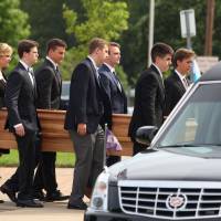 The casket carrying the remains of Otto Warmbier as it is carried out of Wyoming High School in Wyoming, Ohio, on June 22. The United States on Wednesday officially set a Sept. 1 start date for a ban prohibiting its citizens from traveling to North Korea. U.S. travel ban to North Korea may exempt reporters, aid workers