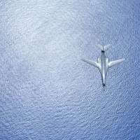 A U.S. Air Force B-1B Lancer flies during a 10-hour mission Monday from Andersen Air Force Base, Guam, on a route covering the vicinities of Kyushu, the East China Sea and the Korean Peninsula. Trump's North Korea comments may undermine his aim of getting China to help