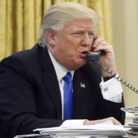 President Donald Trump speaks on the phone Jan. 28 with Australian Prime Minister Malcolm Turnbull in the Oval Office of the White House in Washington. Transcripts of Trump’s conversations with the leaders of Mexico and Australia in January offer new details on how the president parried with the leaders over the politics of the border wall and refugee policy, with random asides on subjects including drug abuse in New Hampshire. Transcripts reveal Trump's terse phone chats with leaders of Mexico, Australia, self-image worries