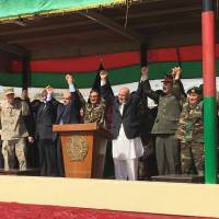 Afghan President Ashraf Ghani (to the right of the podium) is joined by top U.S. and Afghan military leaders for the launch of the Afghan Army’s new special operations corp on Sunday at Camp Morehead, a training base southeast of Kabul. Trump to address troops, the nation on new 'path forward' Afghan strategy