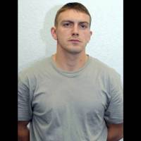 This is an undated photo provided by the Metropolitan Police of former Royal Marine Ciaran Maxwell. A judge sentenced the former Royal Marine to 18 years in prison Monday for a series of terrorism-related offenses. Thirty-one-year-old Ciaran Maxwell lived a double life as a member of the military and as a bombmaker for dissident Irish Republicans. | METROPOLITAN POLICE / VIA AP