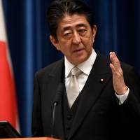 Prime Minister Shinzo Abe speaks during a news conference in Tokyo on Thursday. Abe softens stance on deadline for constitutional reform proposals, deferring to LDP