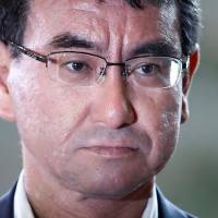 Taro Kono, newly appointed foreign minister, arrives at the Prime Minister\'s Office in Tokyo on Thursday. His candid and liberal-leaning opinions &#8212; often articulated on his blog &#8212; have made him stand out among his more conservative peers in the Liberal Democratic Party. | REUTERS